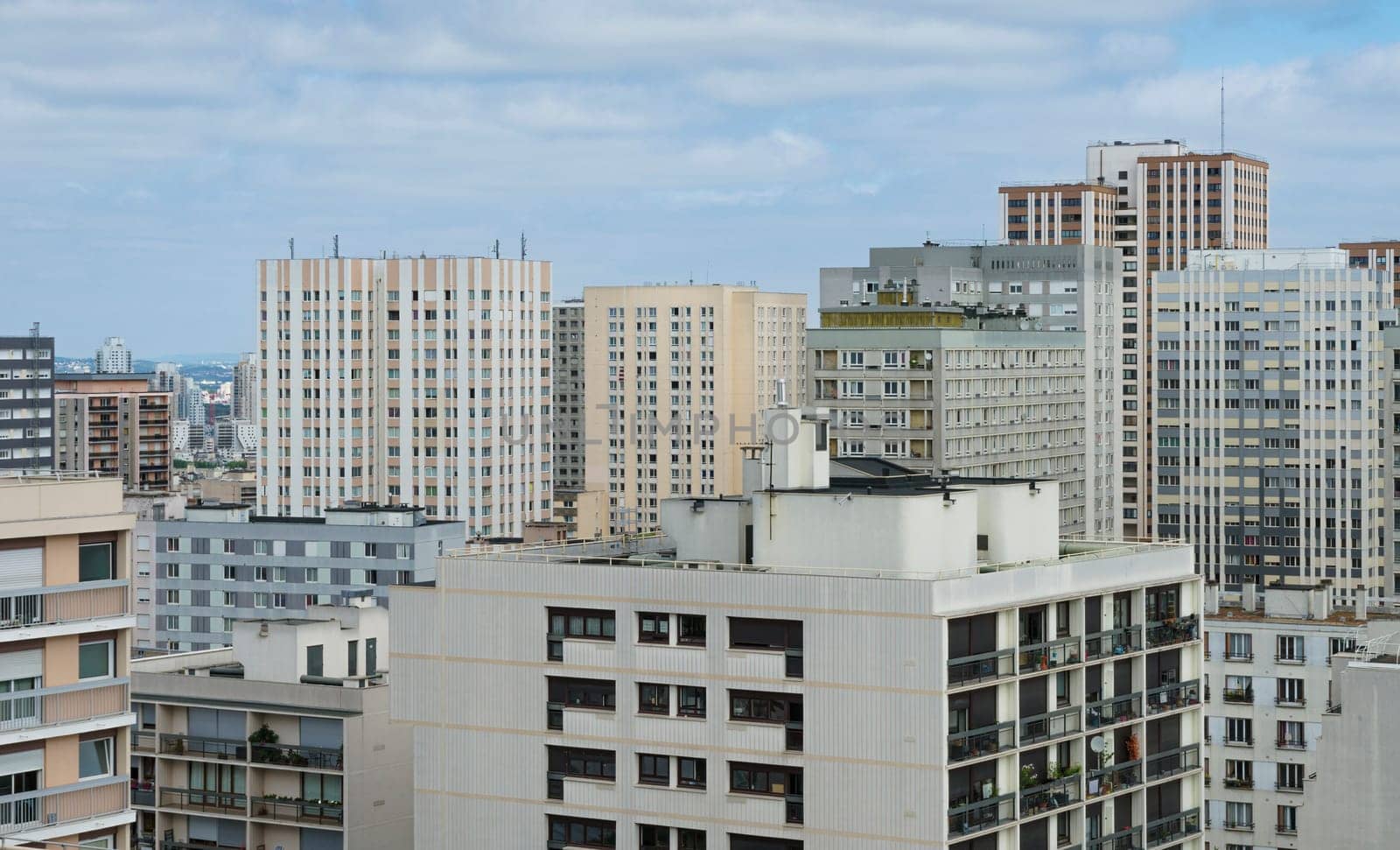 Aerial view of the residential area of Beleville in Paris with light-colored buildings for housing. by csbphoto