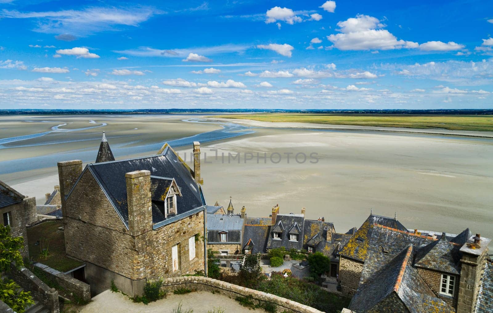 View from Mont Saint Michel of the bay in Normandy, France. by csbphoto