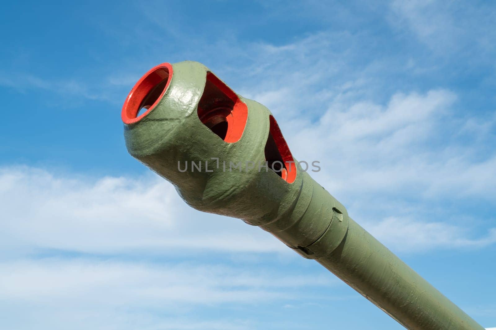 the barrel of the tank against the blue sky by roman112007