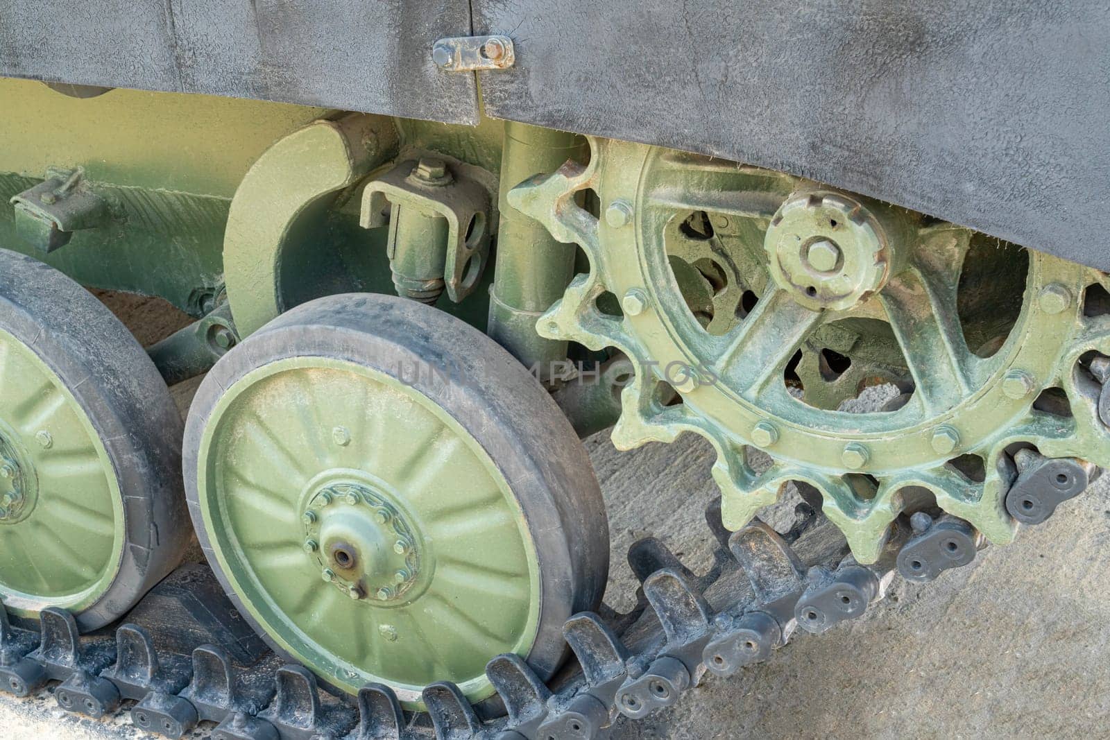 caterpillar track of military armored vehicles close-up. photo