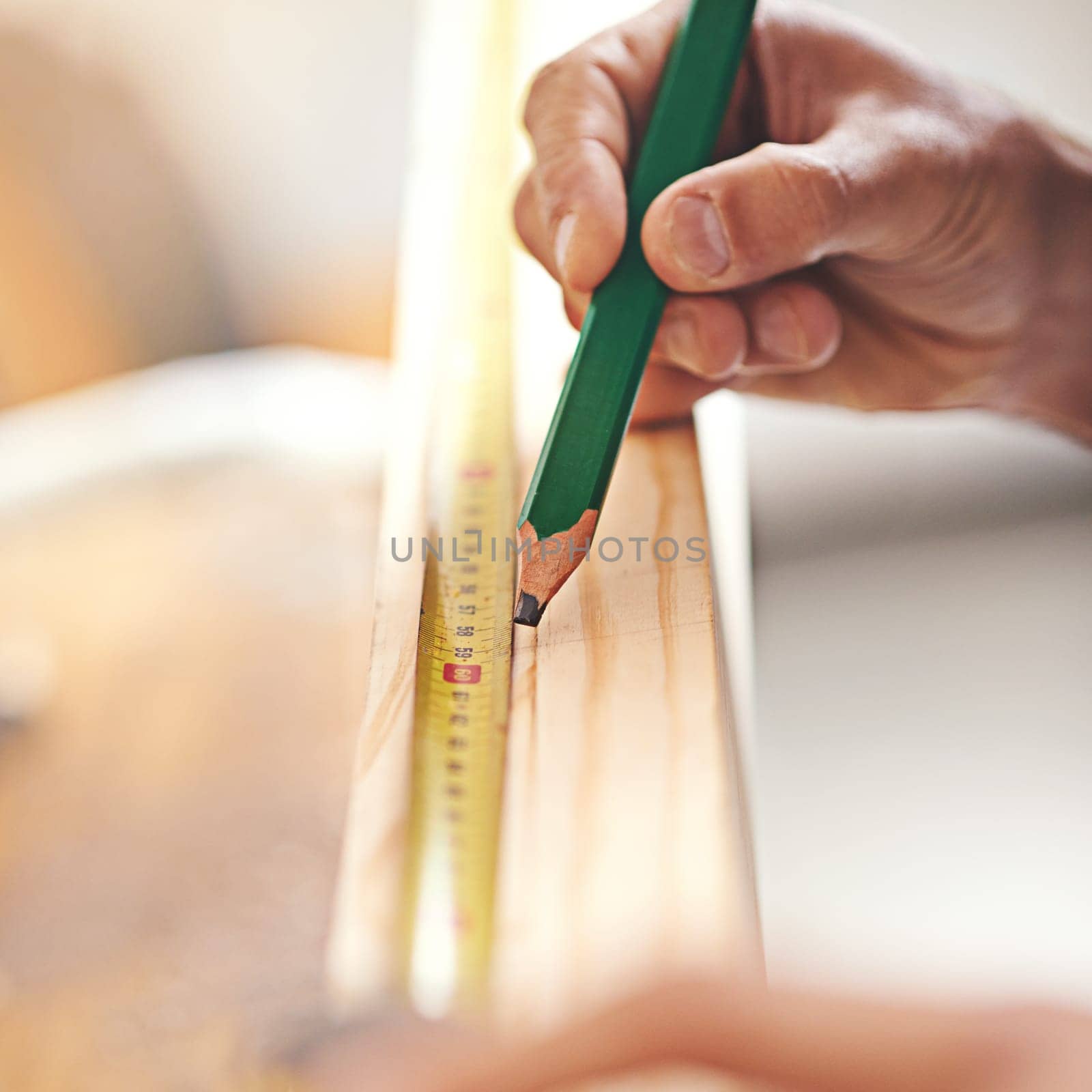 Carpenter, wood and measure with hands of man in workshop for building, manufacturing and creative. Planning, industry and drawing with closeup of handyman for builder, lumber and maintenance.