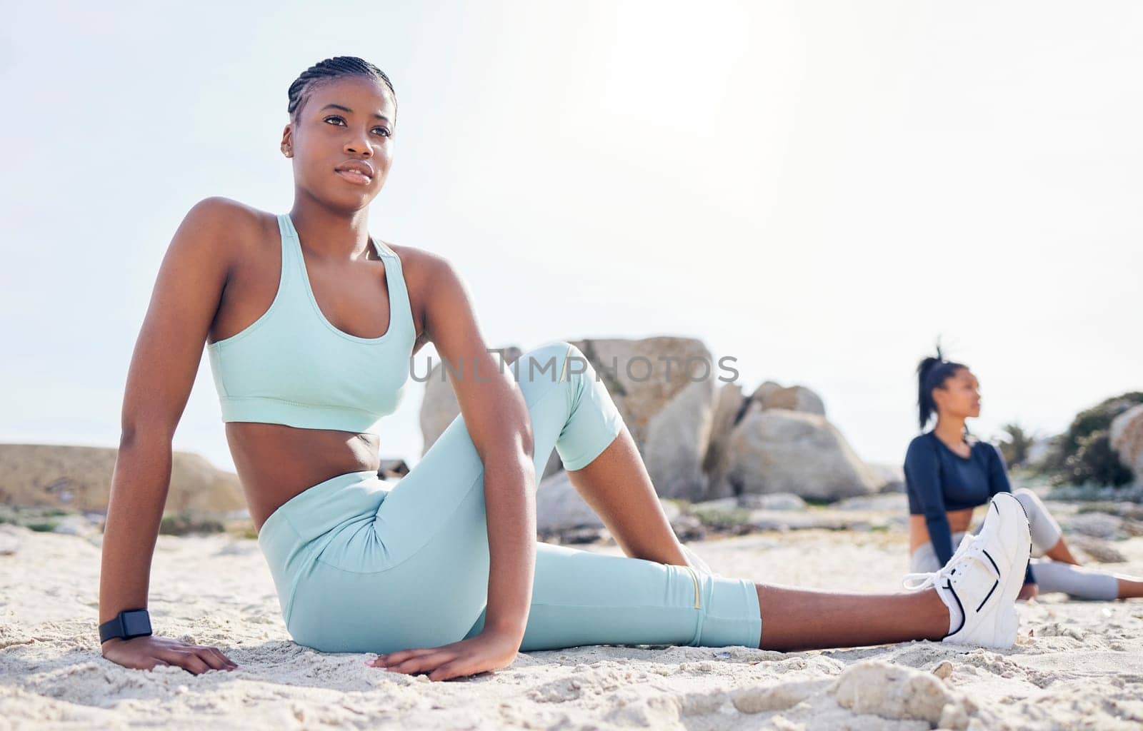 Stretching, summer and friends with women at beach for running, yoga and workout. Relax, health and wellness with female runner and warm up in nature for training, teamwork and cardio performance by YuriArcurs