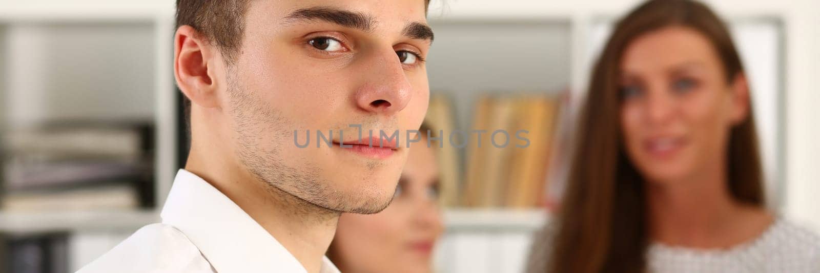 Portrait of young student intern at job interview or corporate training by kuprevich