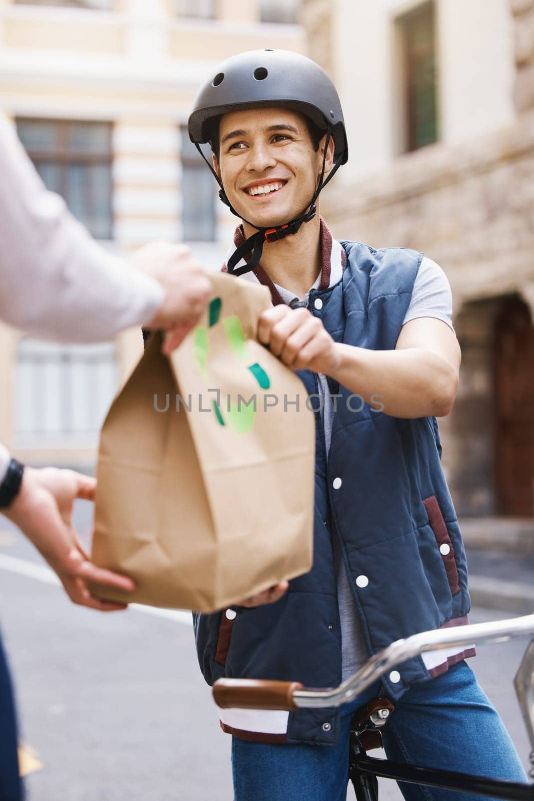 Man, delivery bicycle and smile with bag, order or e commerce for food, product or sustainable transport. Young guy, bike and cbd street for customer experience, chat or eco friendly at logistics job by YuriArcurs