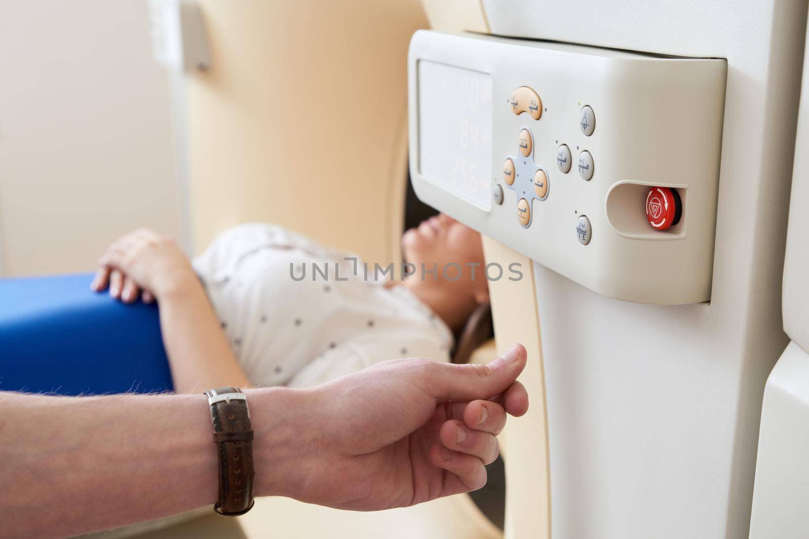 Female patient undergoing MRI - Magnetic resonance imaging in a Hospital. Medical Equipment and Health Care
