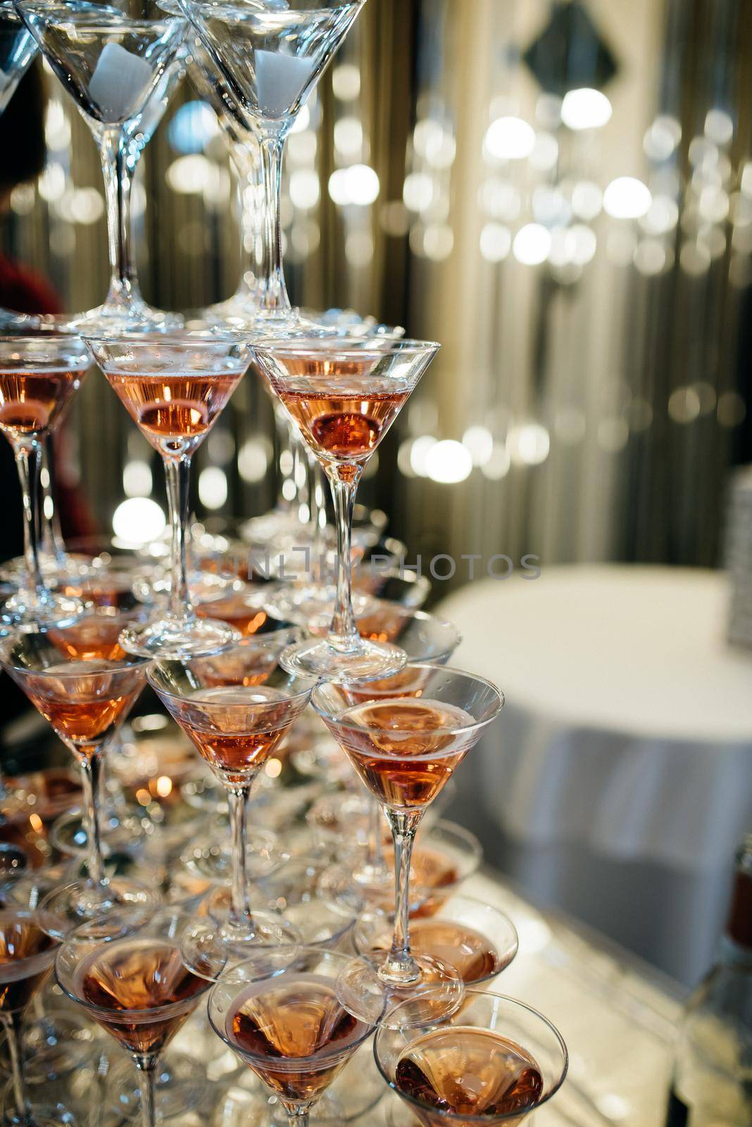 Beautiful Pyramid of Delicious Alcohol Crystal Glass with Champagne. Romantic Celebrations and Party Concept by Mariakray
