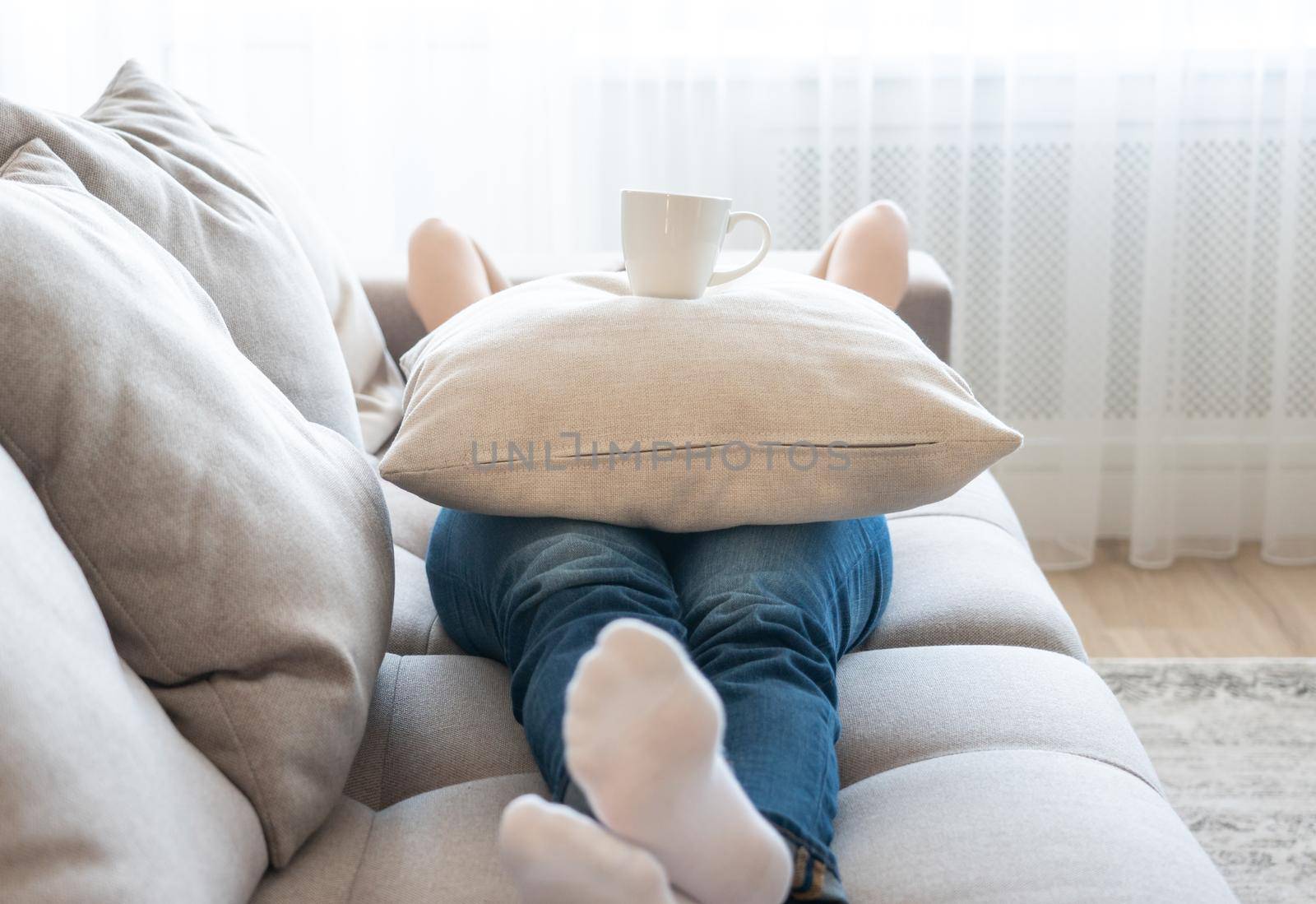 Young woman relaxing on her couch