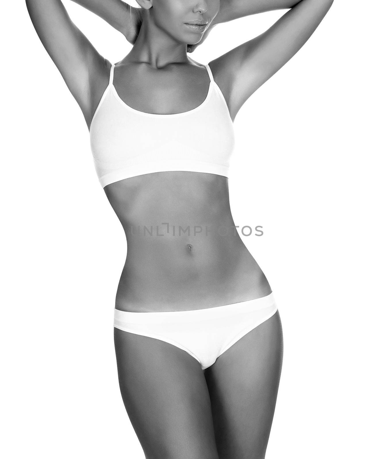 Sexy woman in white underwear on white background, isolated by Nobilior