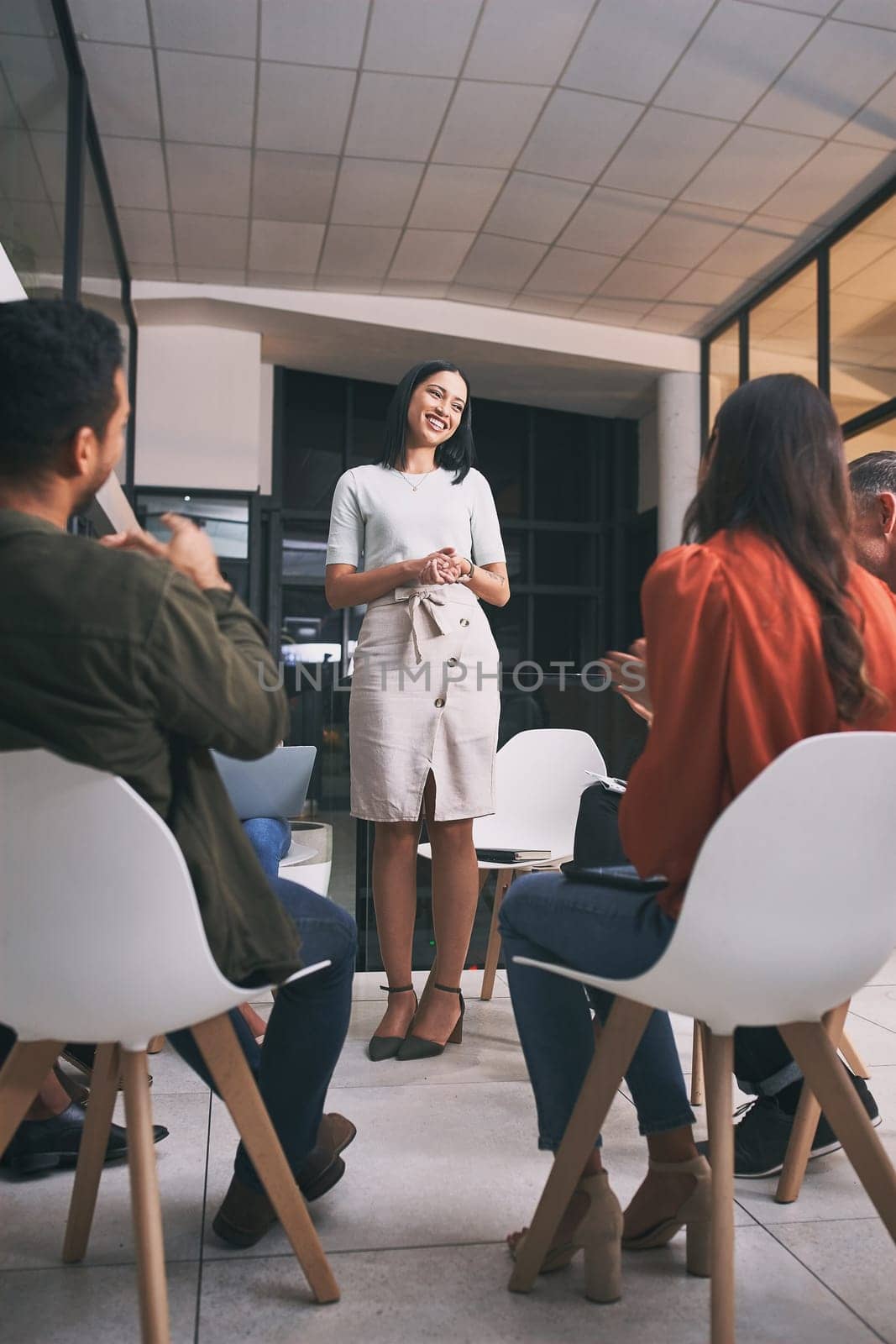 It is amazing what you can accomplish if you do not care who gets the credit. a young businesswoman about to give a presentation