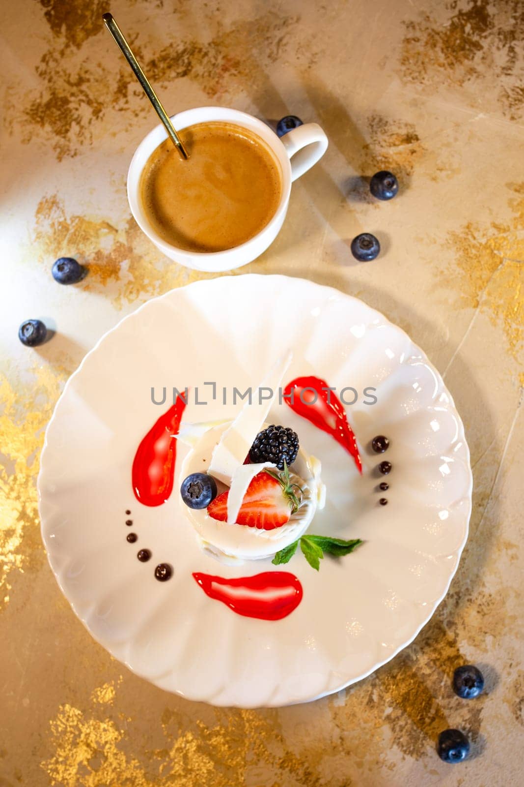 top view creative serving of coke mousse dessert in a restaurant by Pukhovskiy