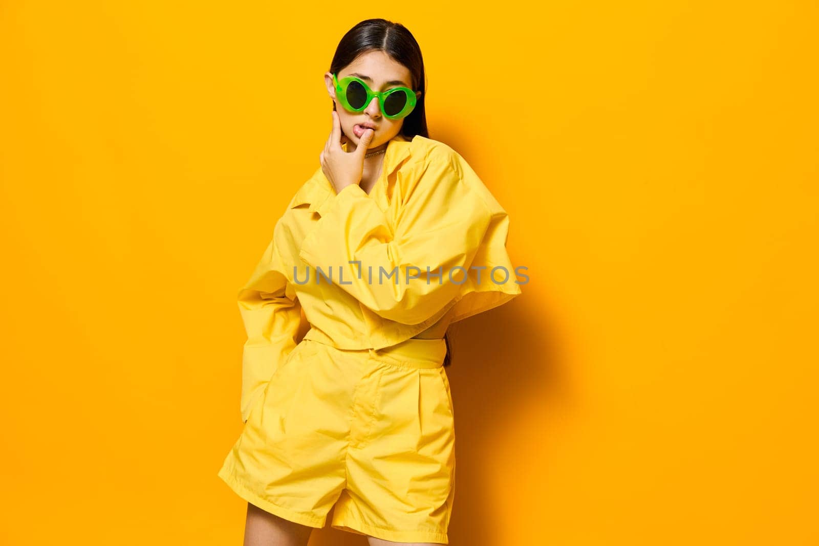 woman cheerful style expression girl hairstyle attractive lady smile happiness sunglasses gesture trendy brunette beautiful lifestyle young fun yellow fashion creative