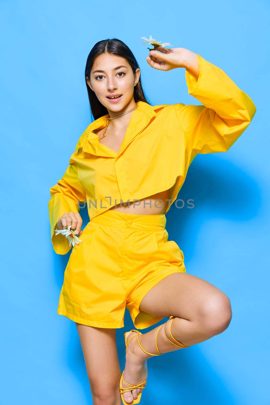 yellow woman young portrait chamomile model smile flower blue happiness health by SHOTPRIME