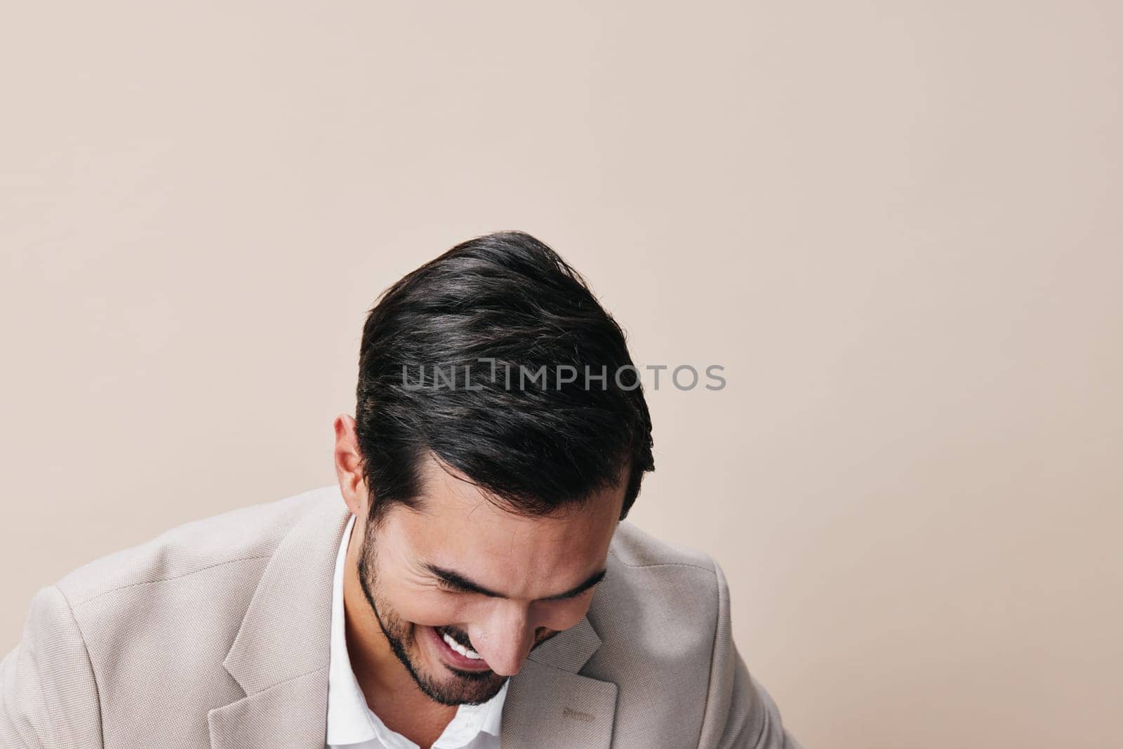 hand man arm confident victory idea winner male studio fashion beige adult suit businessman white business professional successful isolated beard happy