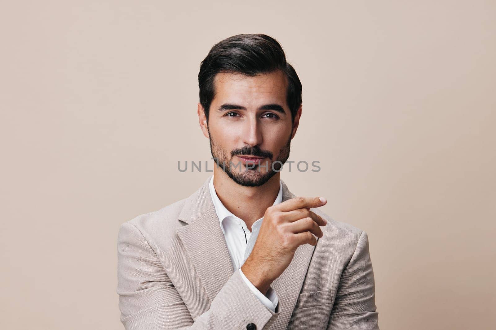 man handsome beard grey job beige person portrait businessman copyspace smiling young executive sexy occupation business fashion happy office attractive suit