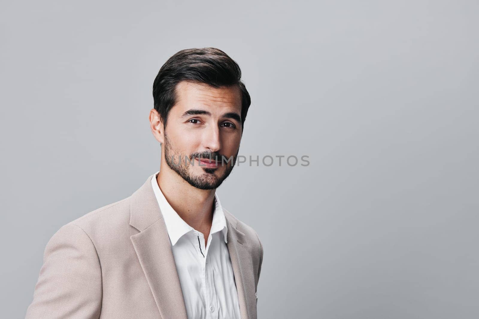 background man executive businessman smile crossed occupation smiling male handsome isolated successful business happy job suit professional beige portrait copyspace entrepreneur