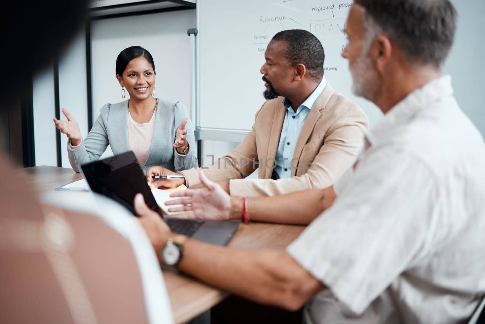 Business people, meeting and planning for strategy, brainstorming or sharing ideas at the office. Woman, group or employees in team discussion, collaboration or project in conference at the workplace.