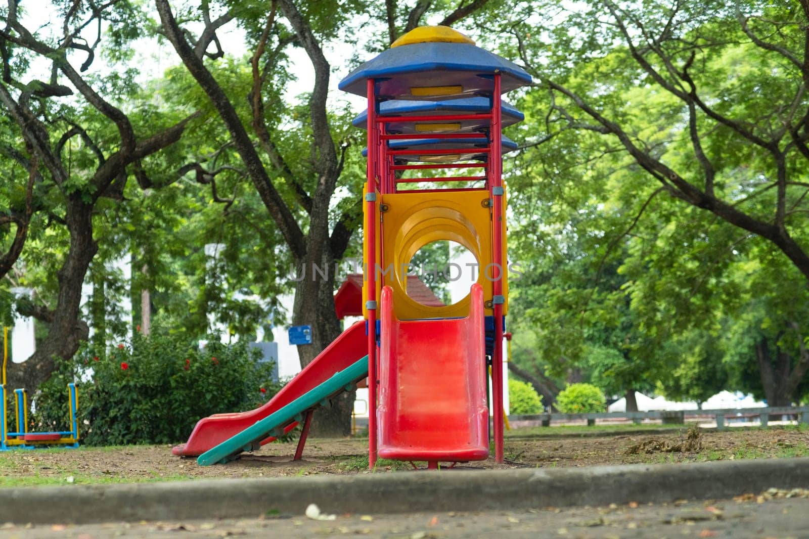 Colorful playground in the park. by TEERASAK