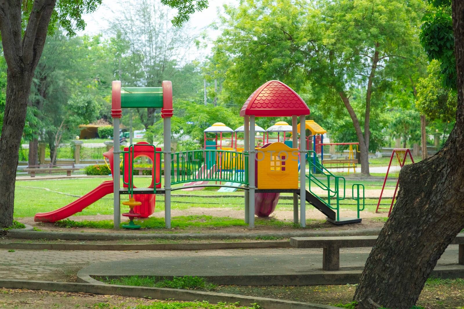 Colorful playground in the park. by TEERASAK