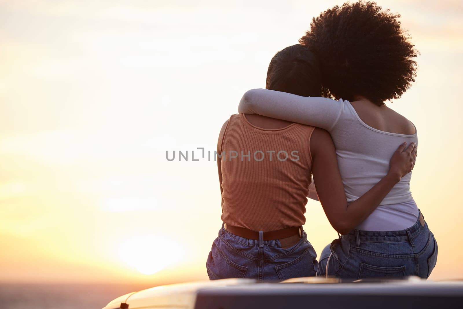 Love, hug and sunset with lesbian couple at beach for relax, romance and sky mockup space. Lgbtq, freedom and pride with women hugging on nature date for partner, trust and summer vacation.