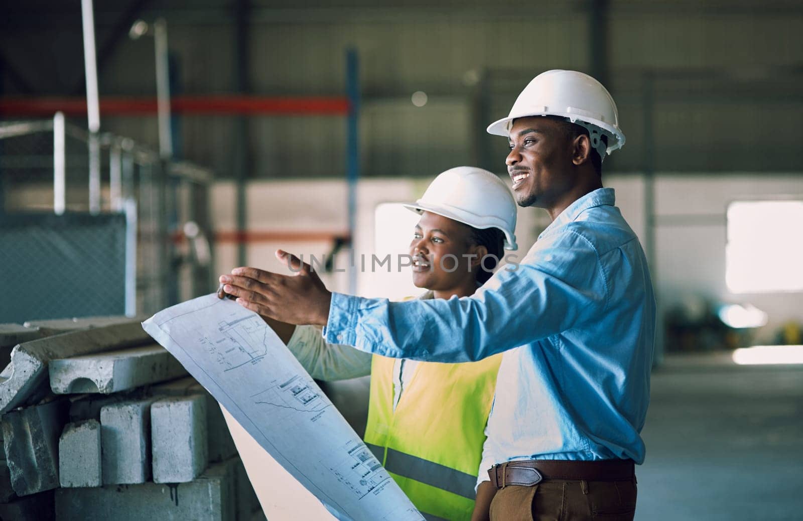 Black people, architect and blueprint for project management in construction, planning or teamwork on site. African man and woman contractor with floor plan and documents for industrial architecture by YuriArcurs