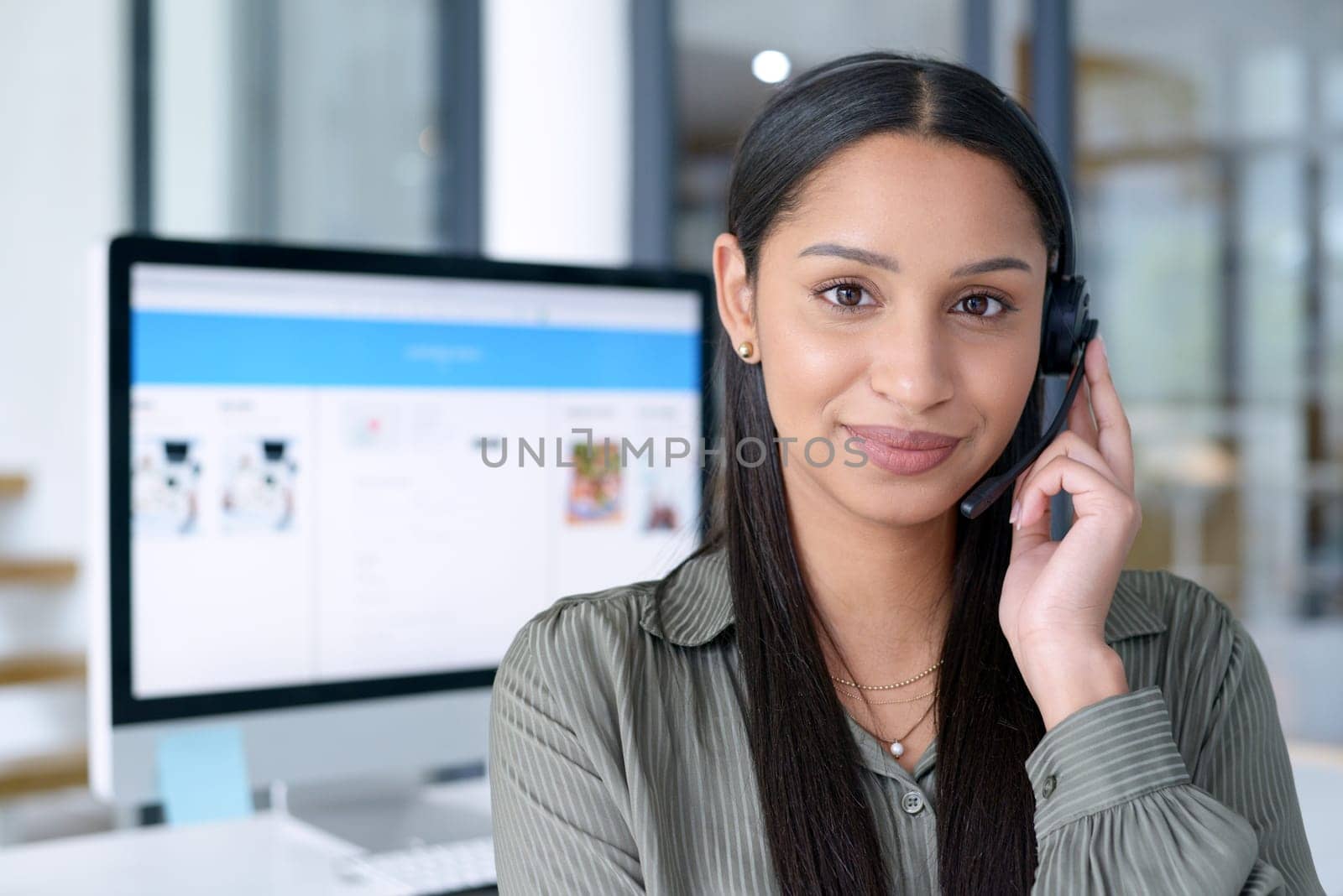 Woman in portrait, call center with CRM and contact us, communication with headset and technology in office. Female consultant in customer service, telemarketing or tech support with help desk job.