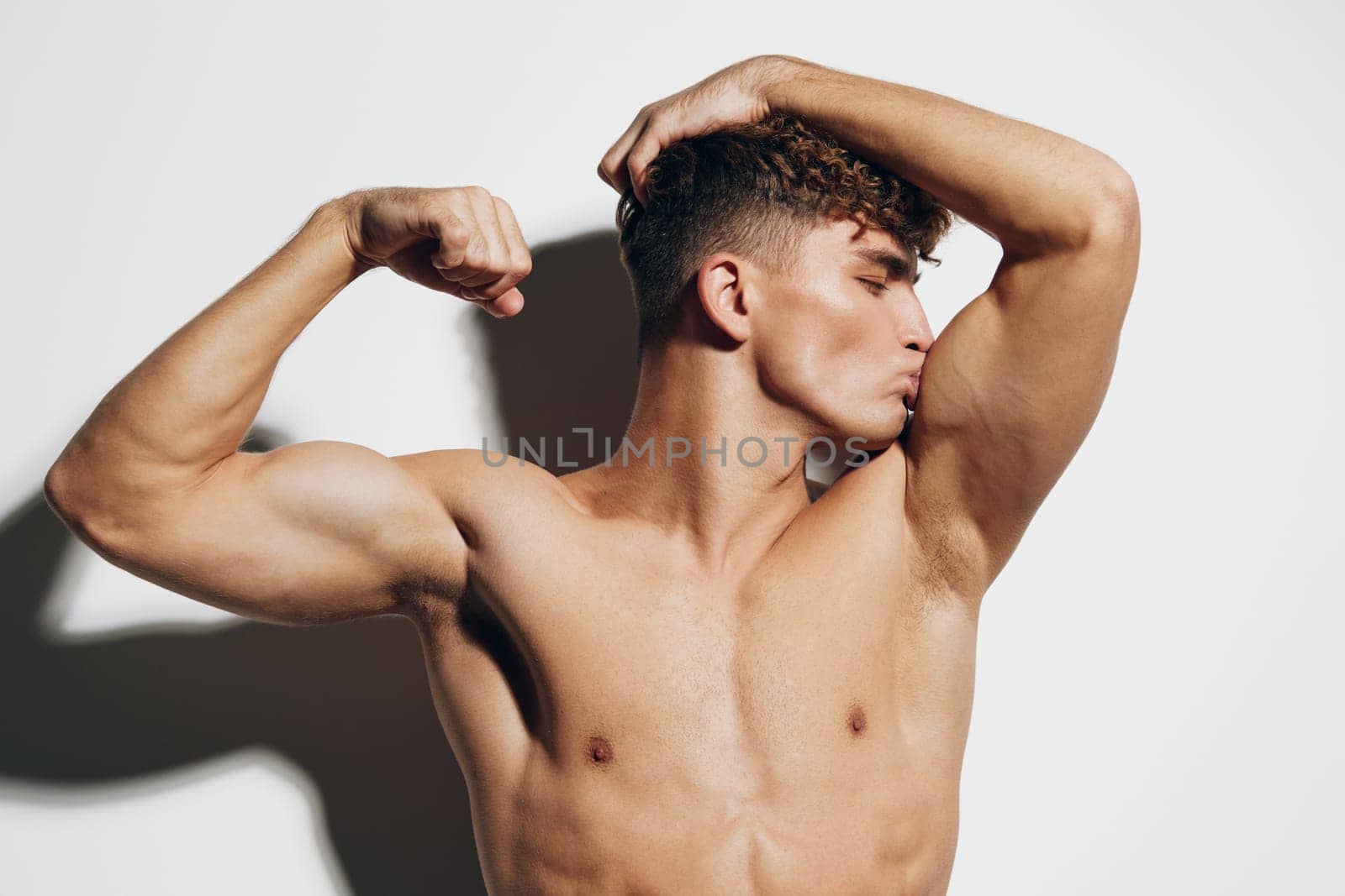 man athletic model gray background torso fit beauty gray handsome healthy studio standing male sport shirtless