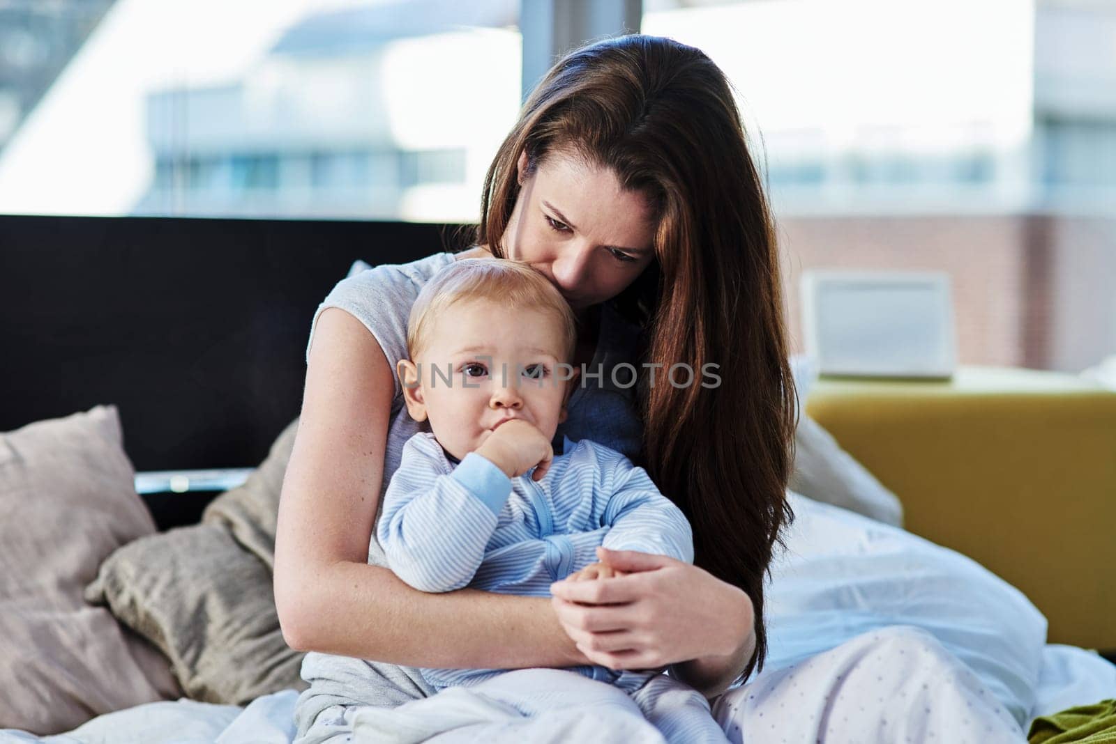 Mother, baby and sad with depression at family home due to mental health and is frustrated. Child, mom and postpartum with worry and anxiety at home with insomnia has love for children development