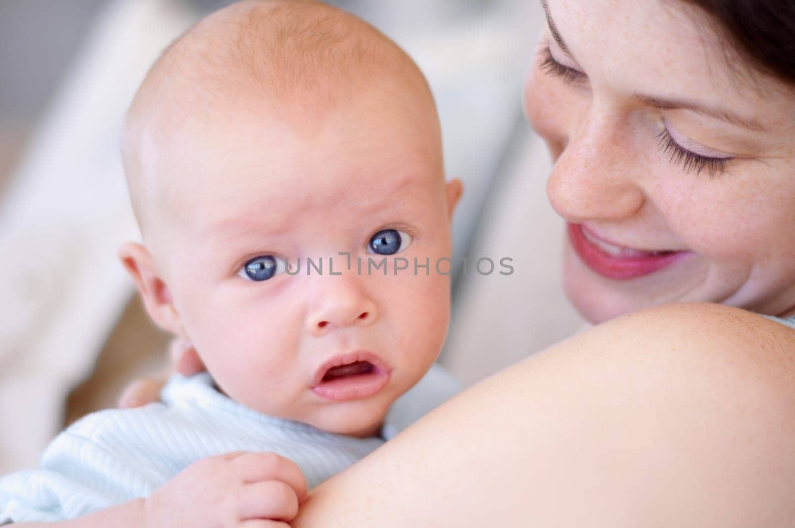 Portrait, child and mom holding baby, bonding and care together in home. Face, kid and mother carrying newborn, infant or young toddler, playing and enjoying quality time with love, family and happy