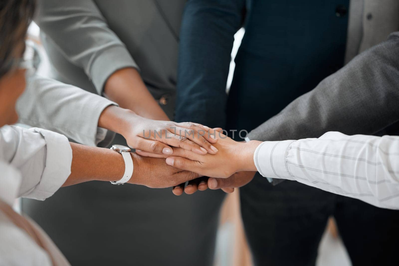 Teamwork, hands together and business people in cooperation, team building and solidarity. Collaboration, hand huddle and group of employees with motivation, trust or support, goal and partnership.