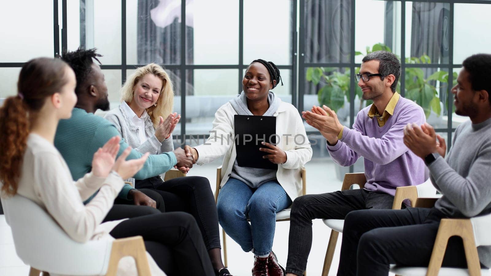 business training and coaching in the company. people sit and chat