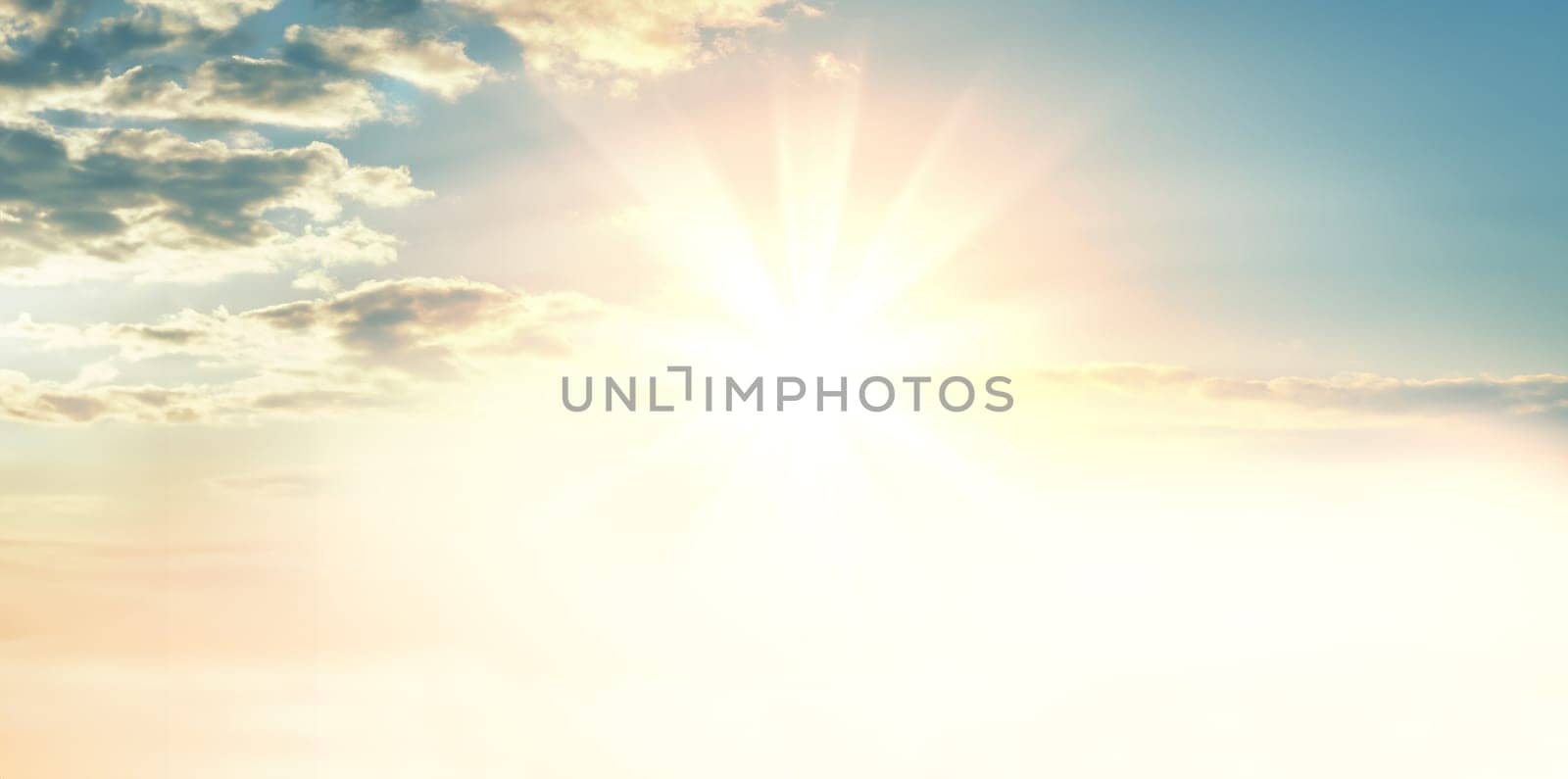 Sunny day. Clouds and the sun. Nature background