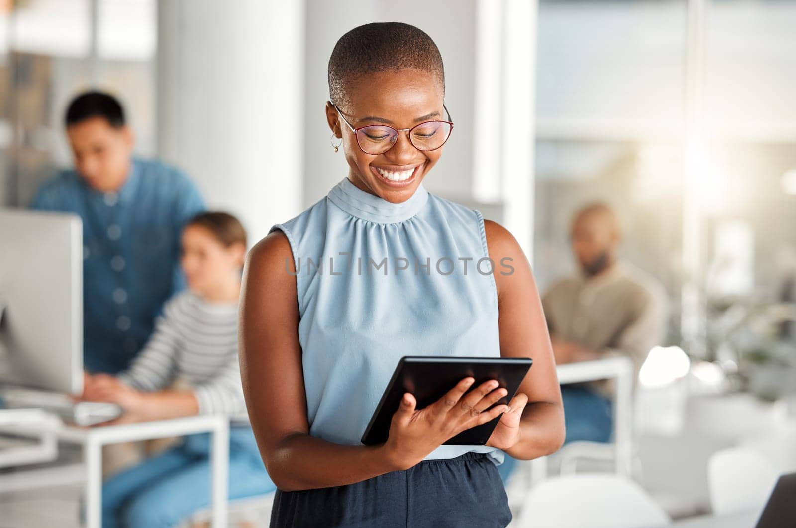 Happy, business tablet and black woman, designer or creative in coworking office. Touchscreen, technology and African female professional on email app, design research or website, internet or reading by YuriArcurs