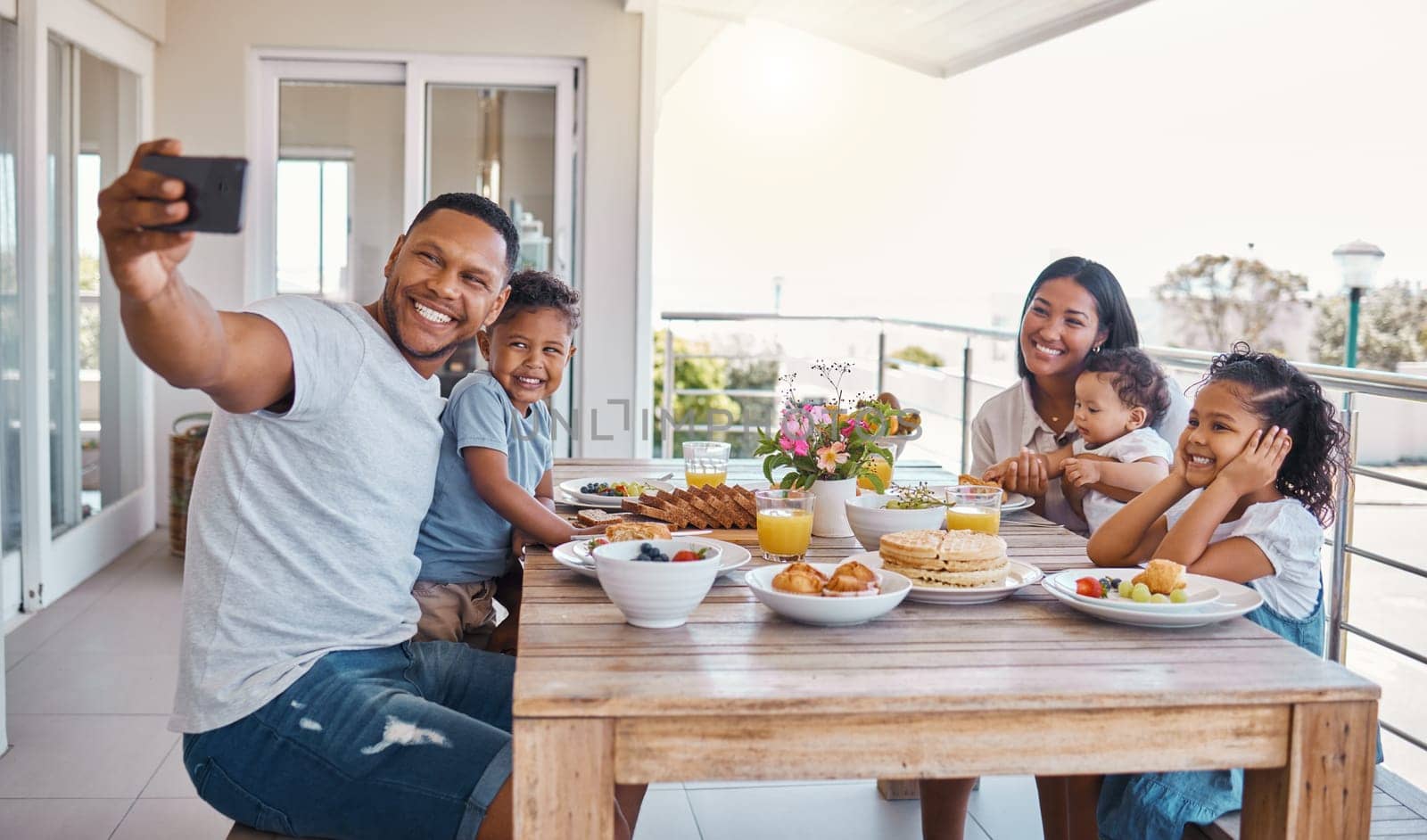 Outdoor family selfie, lunch and kids with father, mother and daughter with smile, food or social media app. Man, boy children or summer brunch on patio for nutrition, baby or profile picture on blog by YuriArcurs