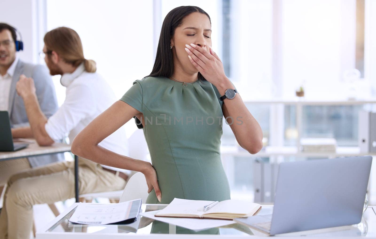 Fatigue, business woman and pregnant with yawn and online at office work. Pregnancy, female employee and maternity of a worker with tired and burnout at a company for report deadline with notes.