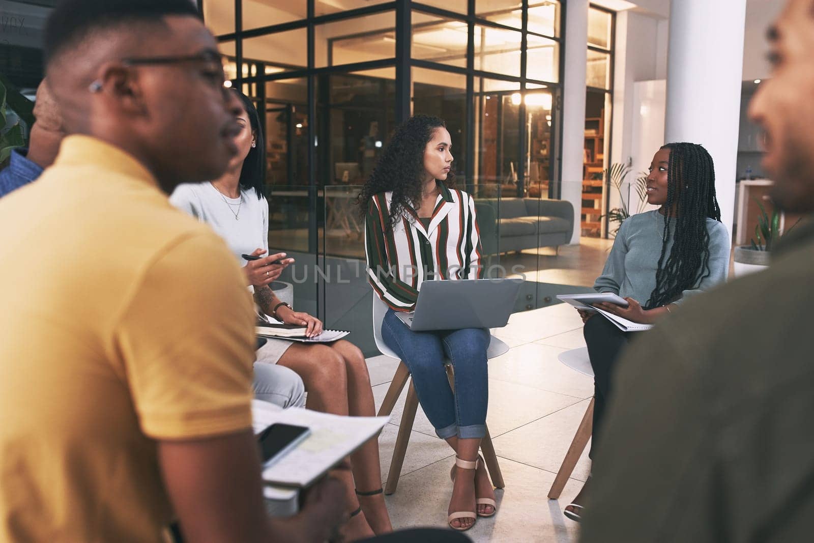 No one can whistle a symphony. It takes a whole orchestra to play it.a team of business people sitting together during a meeting