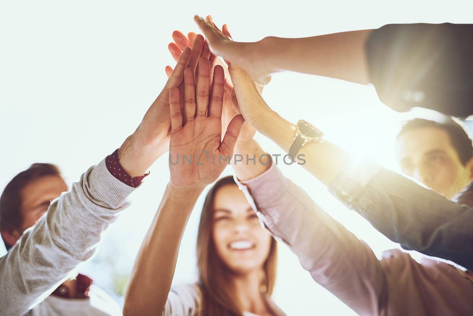 Business people, hands and high five in meeting for winning, success or unity in collaboration outdoors. Group touching hand for team building agreement, victory or solidarity together in nature.