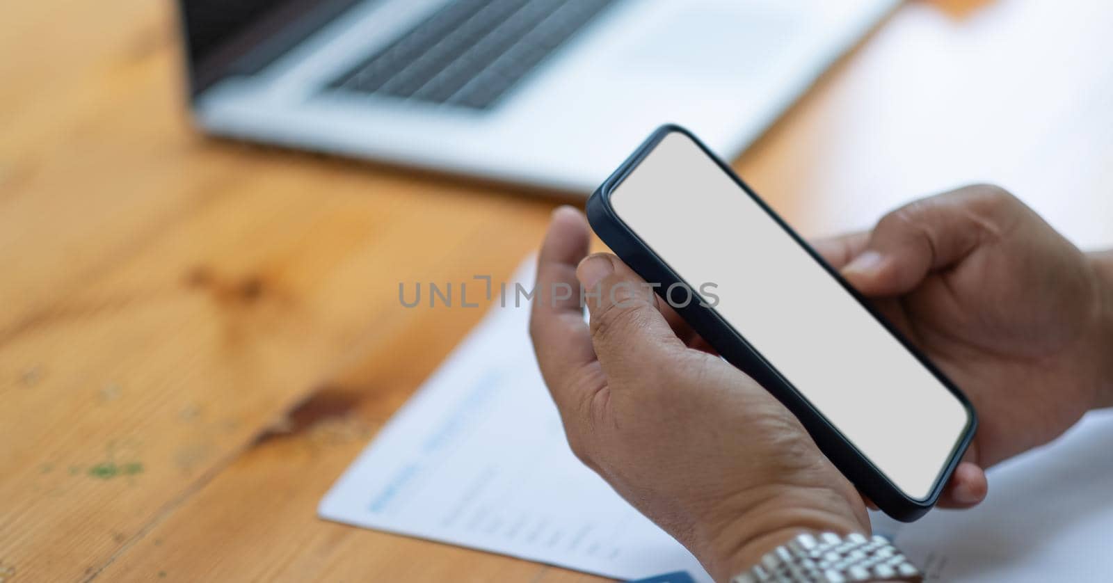 Close up hand of man using smartphone, texting text message, hipster touch screen on smartphone light bokeh, girls using in hands cellphone close up, online internet by nateemee