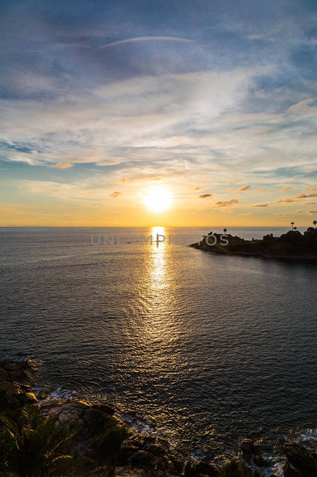 Silhouette yacht. Boat on the andaman sea at sunset in Thailand by Gamjai