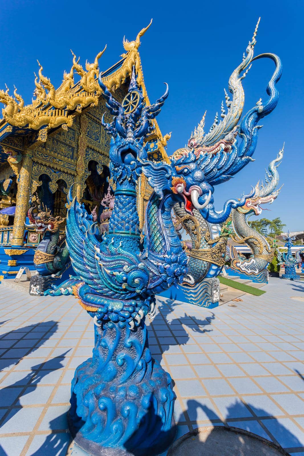 Beautiful of blue temple Wat Rong Sua Ten the amazing temple. by Gamjai