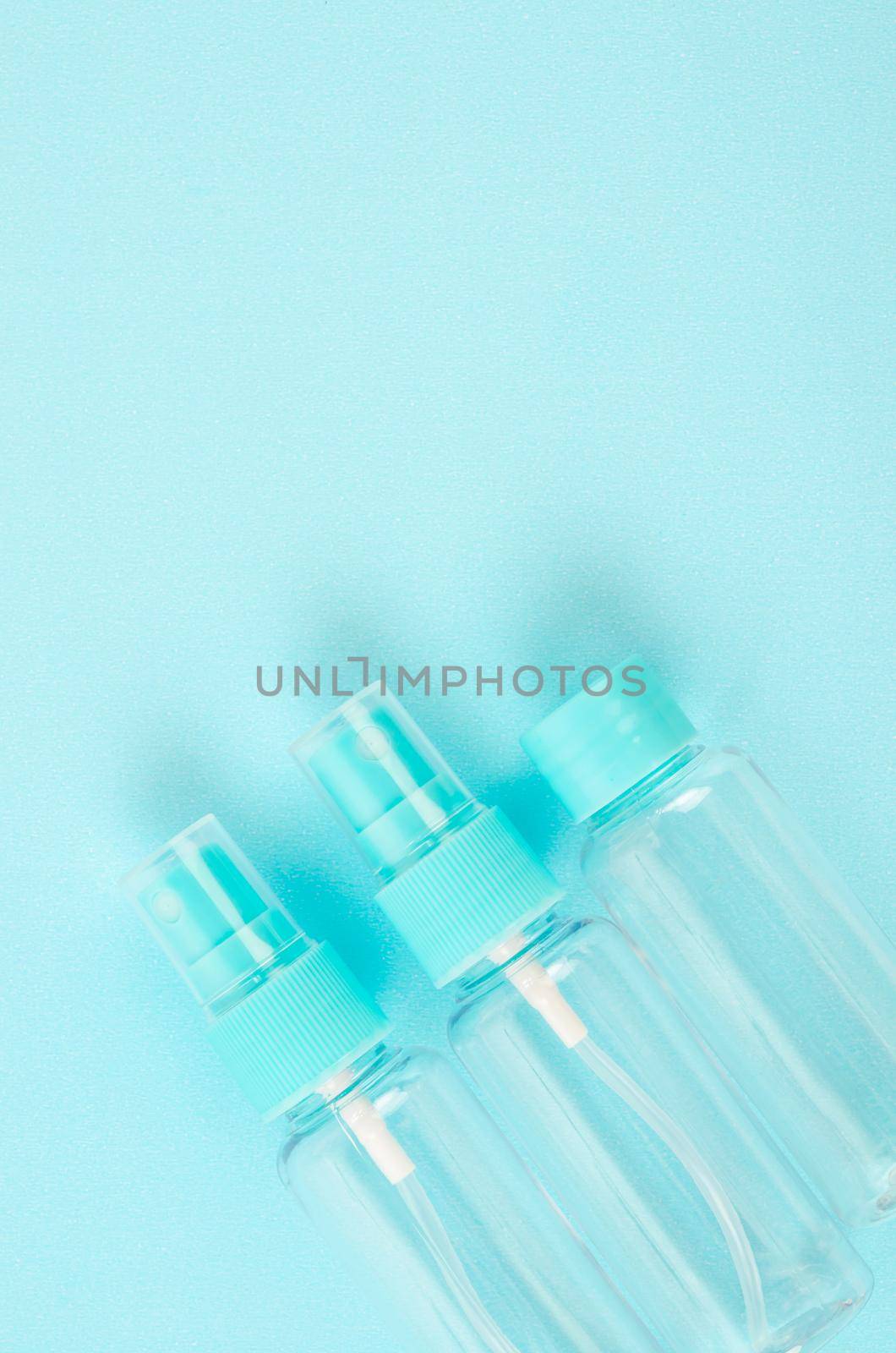 Three plastic clean blank bottles. by Gamjai