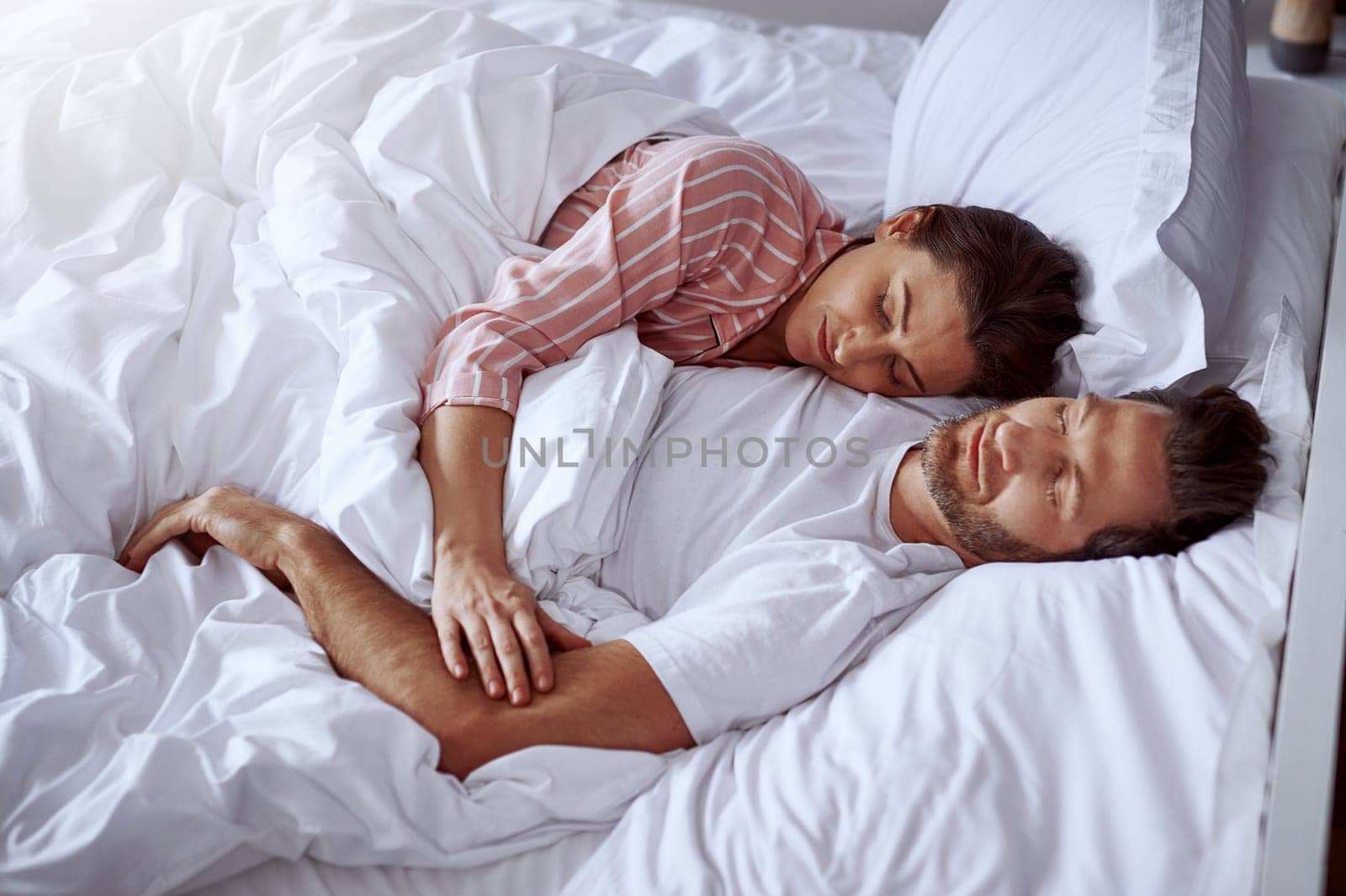 I hope you dream of me. a middle-aged couple sleeping in bed together