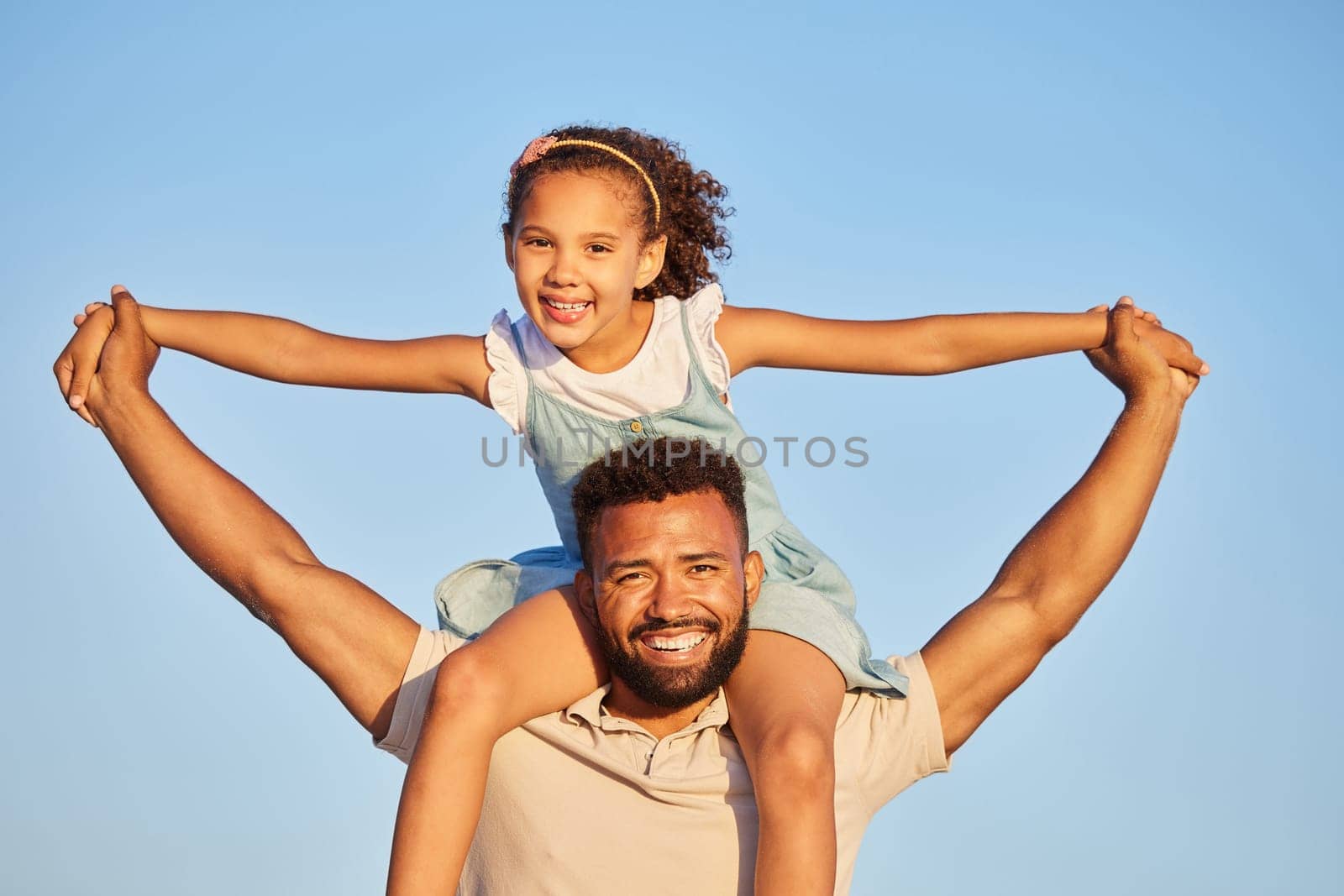 Love, sky or portrait of father with a girl child on a holiday vacation together with happiness in summer. Smile, faces or dad smiling or holding hands in family time with a happy young kid in Mexico by YuriArcurs