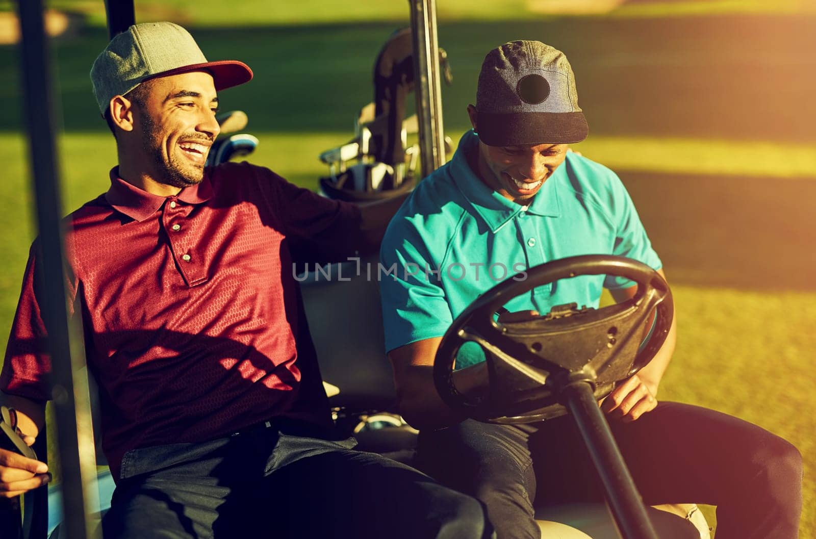 Youre setting yourself up for failure against me. two golfers riding in a cart on a golf course