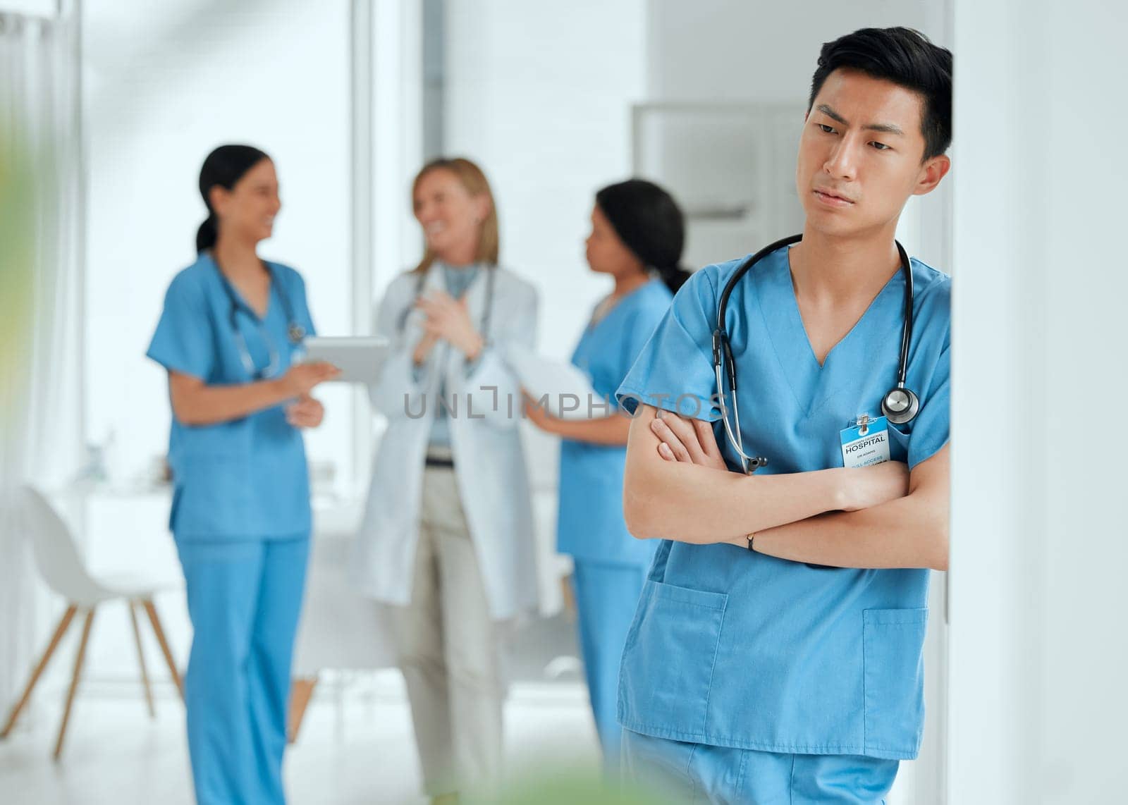 Thinking, stress or sad nurse in hospital meeting with burnout, anxiety or worried with medical emergency. Worry, tired man or depressed Asian healthcare doctor with grief or depression in clinic.