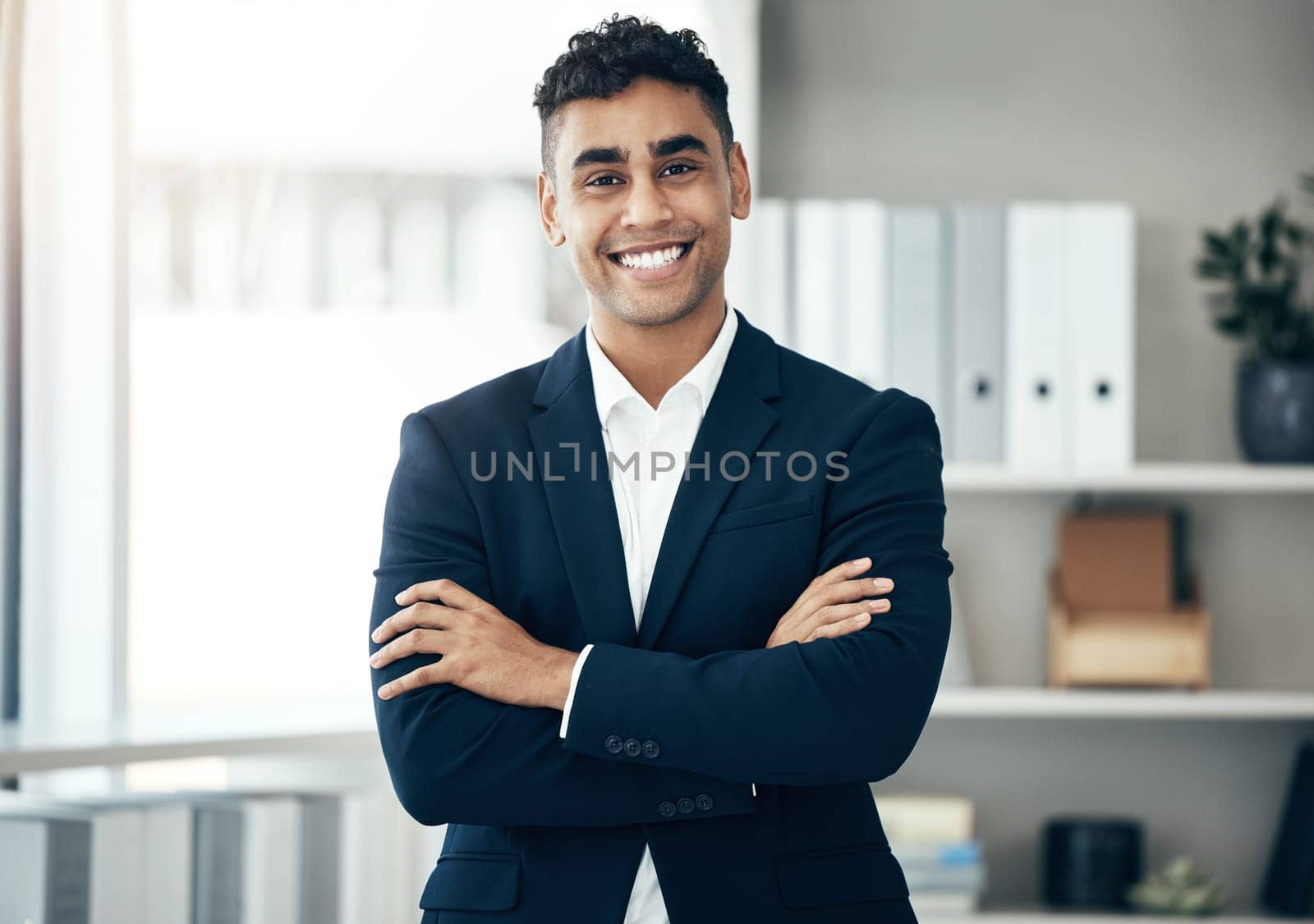 Office, finance and proud business man in company portrait for job motivation, career goals and leadership with a smile. Corporate manager, boss or executive happy with workplace vision or success.