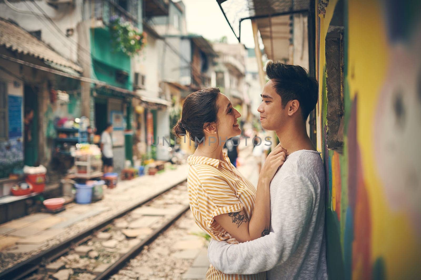 Im in love with everything you do. a young couple sharing a romantic moment in the city of Vietnam