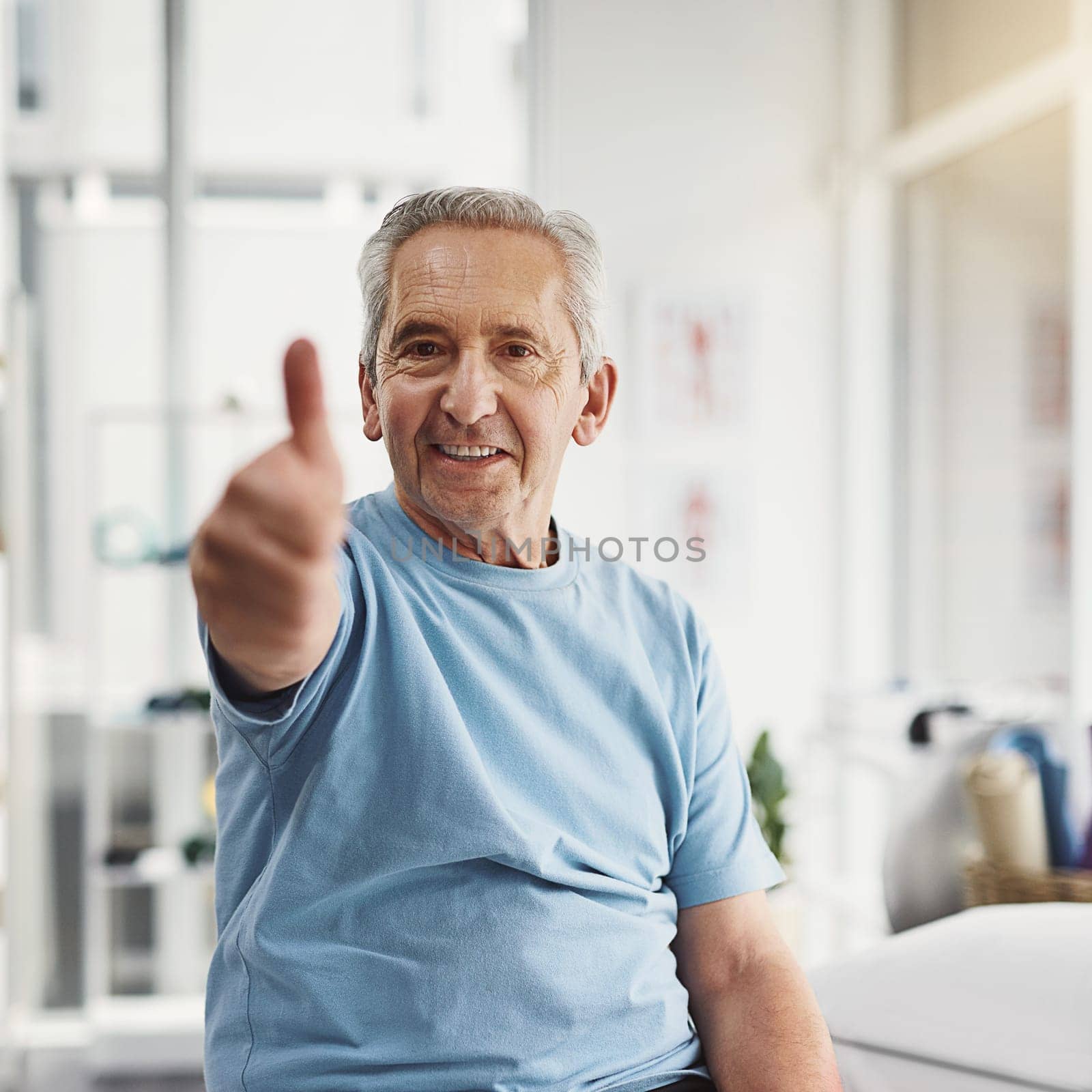 Im well on my way to better health. a senior man showing thumbs up in a rehabilitation centre