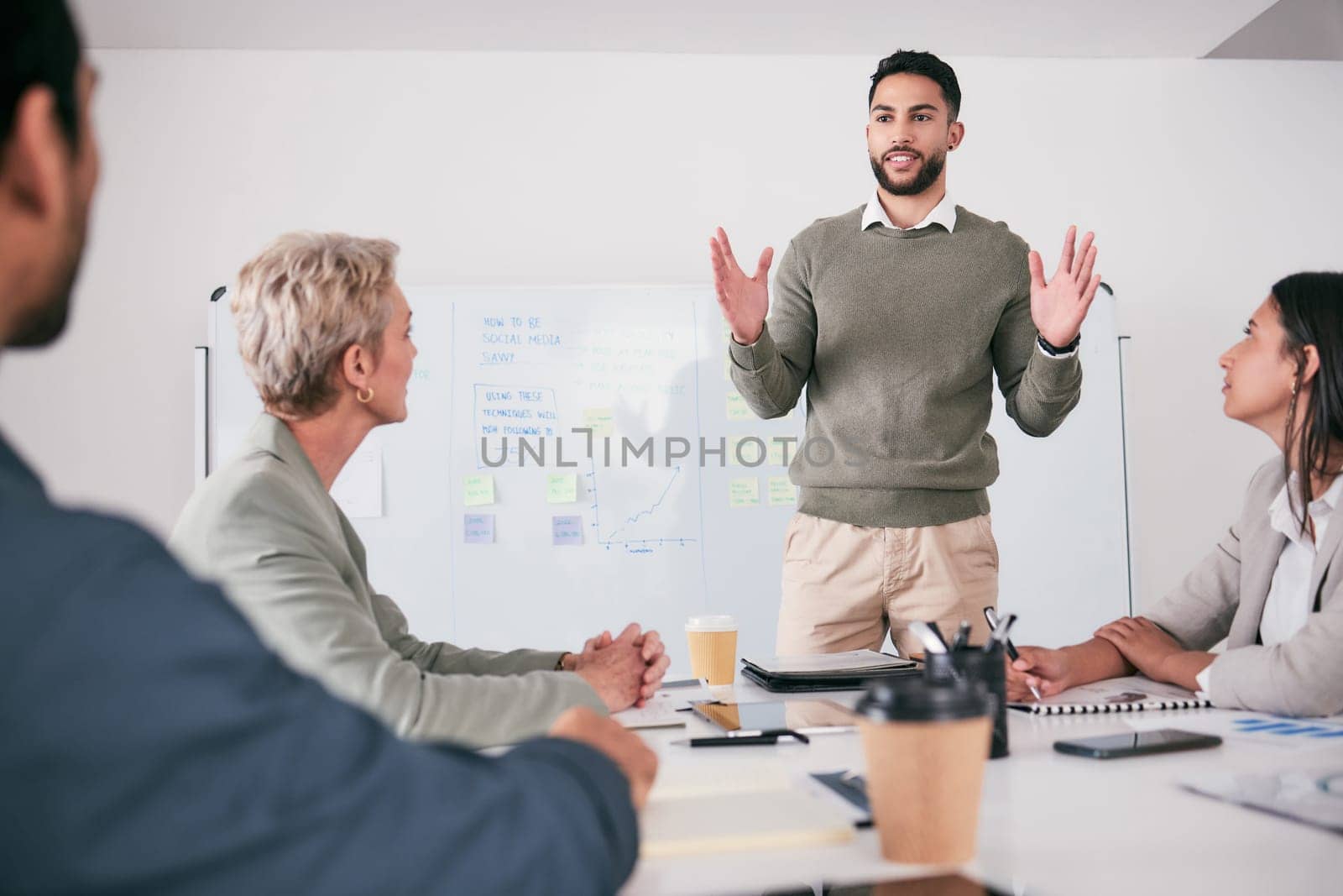 Business meeting, manager presentation and people on whiteboard for audience training, coaching and project ideas. Presenter, speaker or man proposal, company pitch and clients attention in workshop.