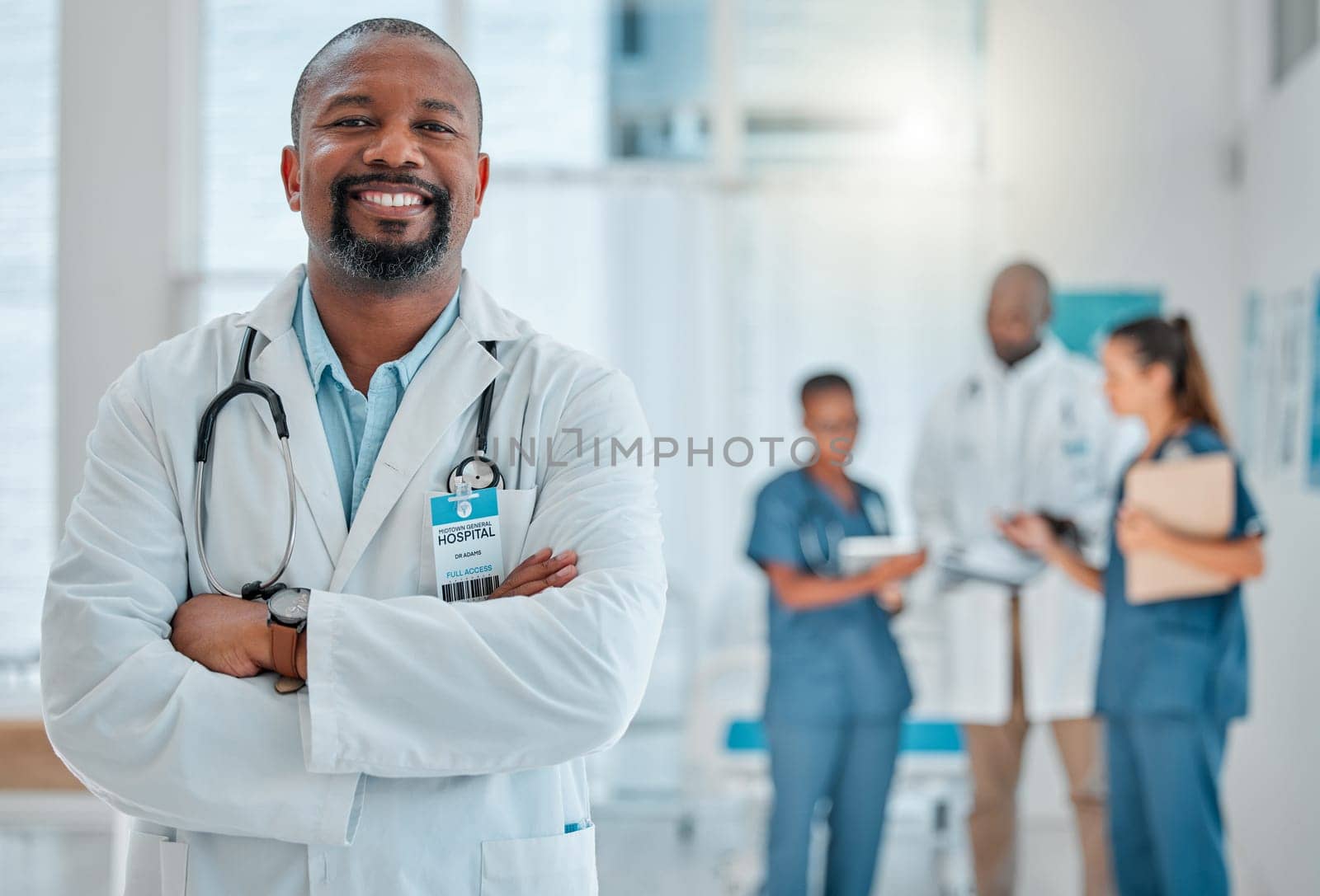 Happy, doctor and portrait of black man with crossed arms for medical help, insurance and trust. Healthcare, hospital team and face of professional male health worker for service, consulting and care by YuriArcurs
