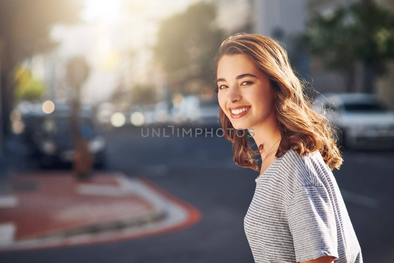 Exploring the great city. Cropped portrait of an attractive young woman spending her day out in the city. by YuriArcurs
